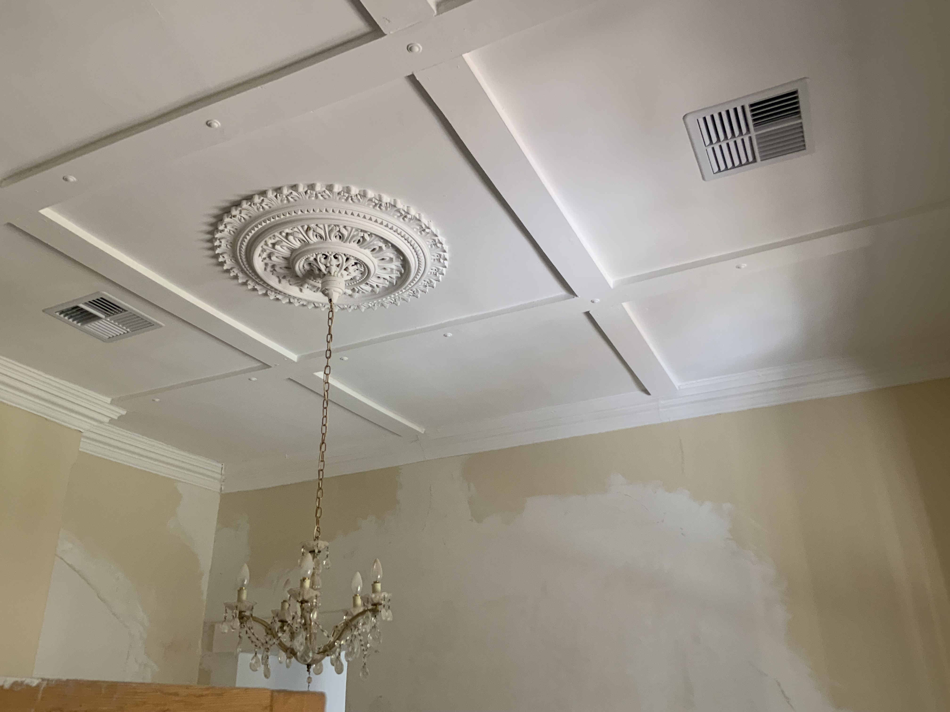 Finished Adelaide period coffered ceiling with ornate decorative rose, chandelier and Victorian cove cornice
